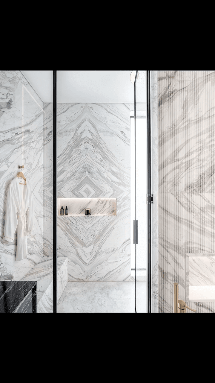 Slab marble bathroom by Moros Construction — luxury Miami bathroom remodel